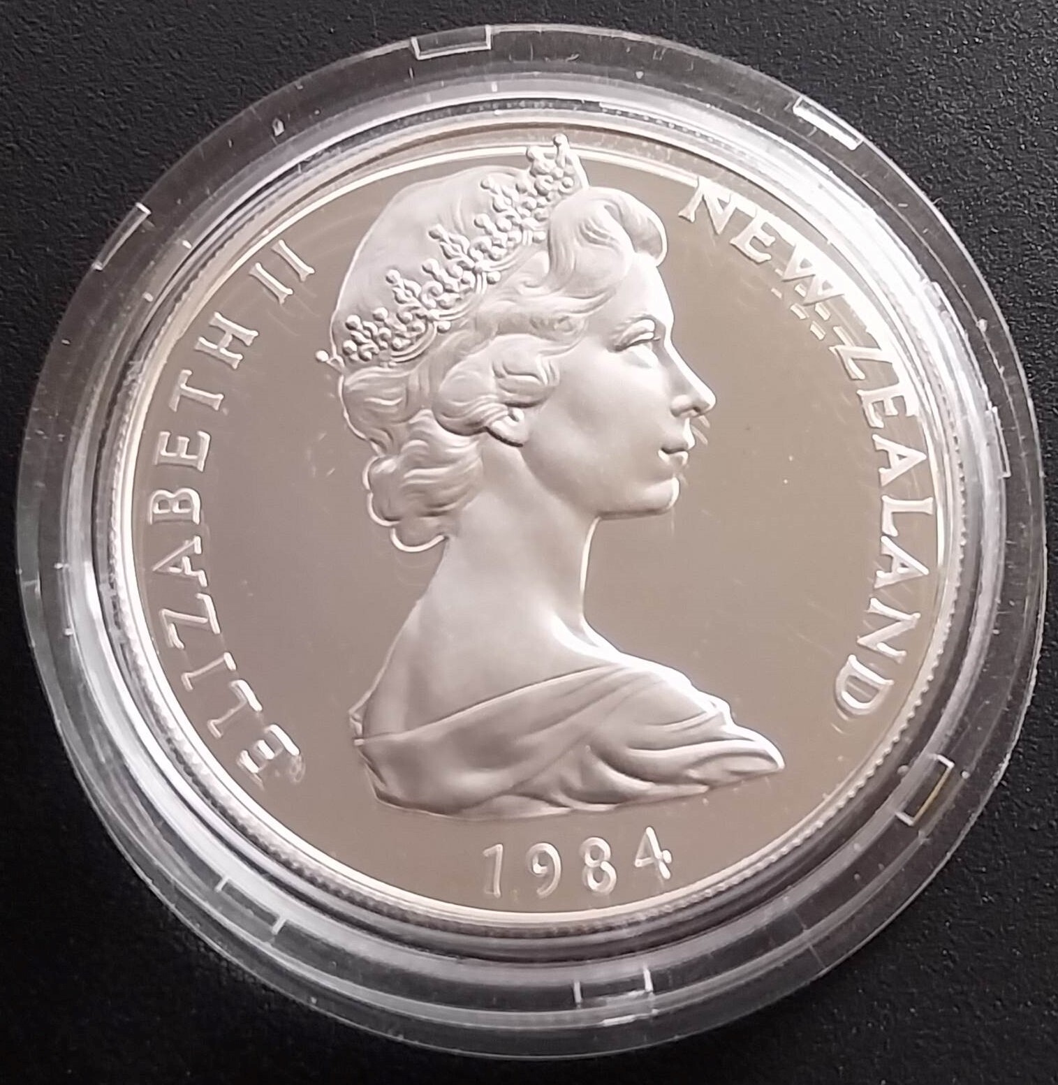 1984 $1 Black Robin Silver Proof Coin in Capsule